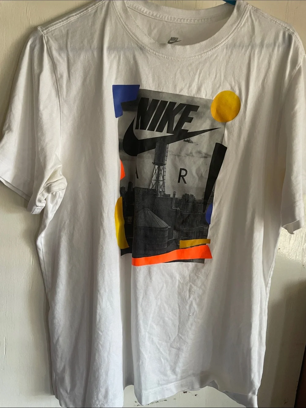Nike White Short-Sleeve Graphic Tee with Multicolor Accents